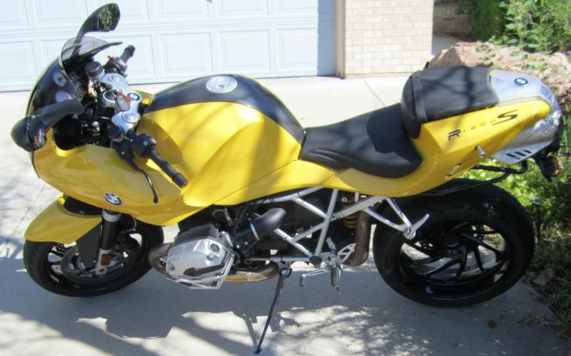2007 BMW R1200S. Yellow. 12,400mi. Has head sliders and Keyed hard cases